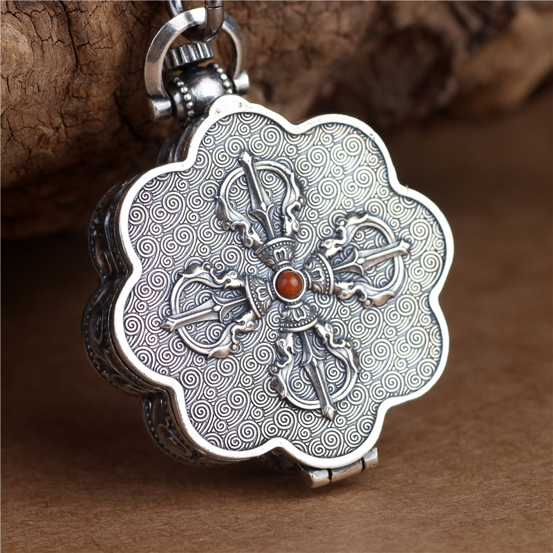 Silver lotus pendant with openable box, six character mantra design