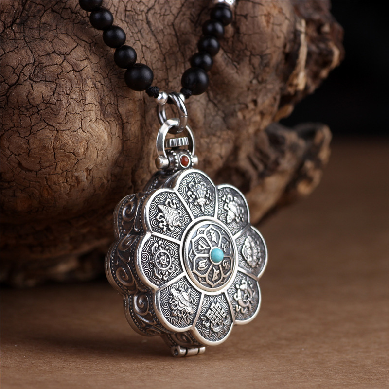 Silver lotus pendant with openable box, six character mantra design