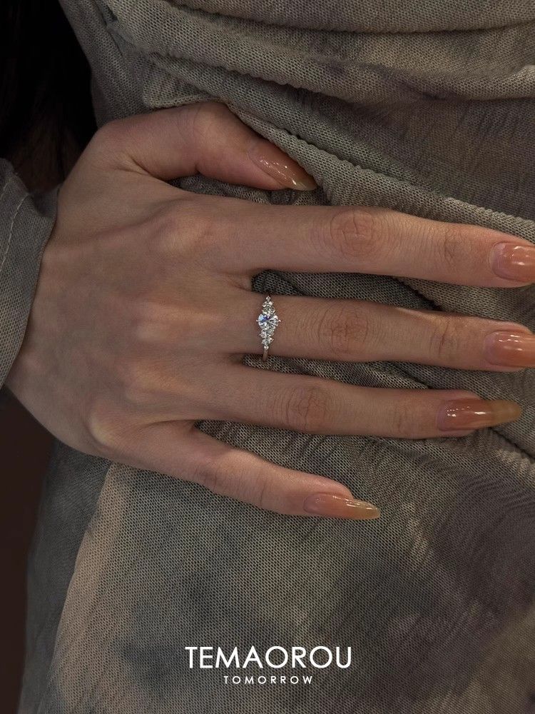 Silver diamond ring, open design, index finger