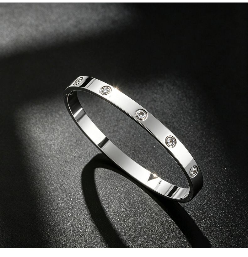 Titan-Stahl Armband, 18K vergoldet, 10 Steine mit Schiebeknoten