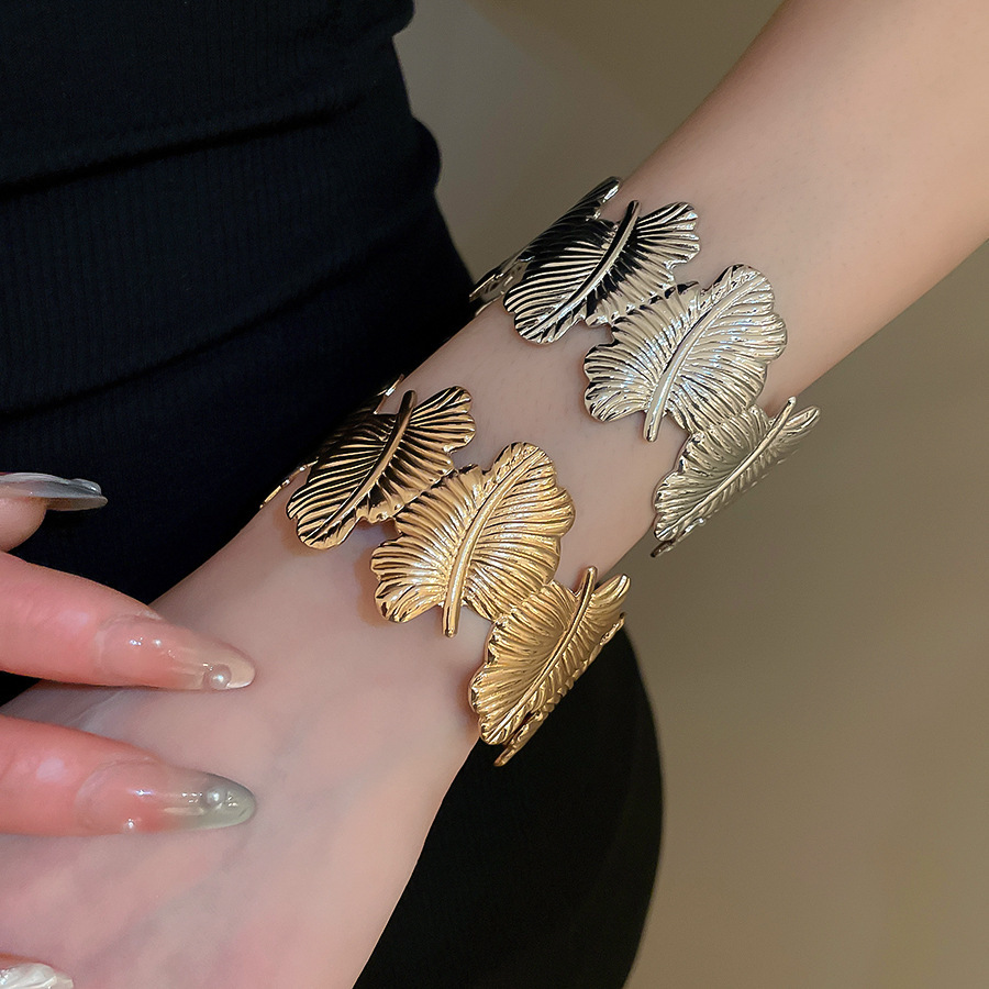Metal geometric open bangle, gold tone