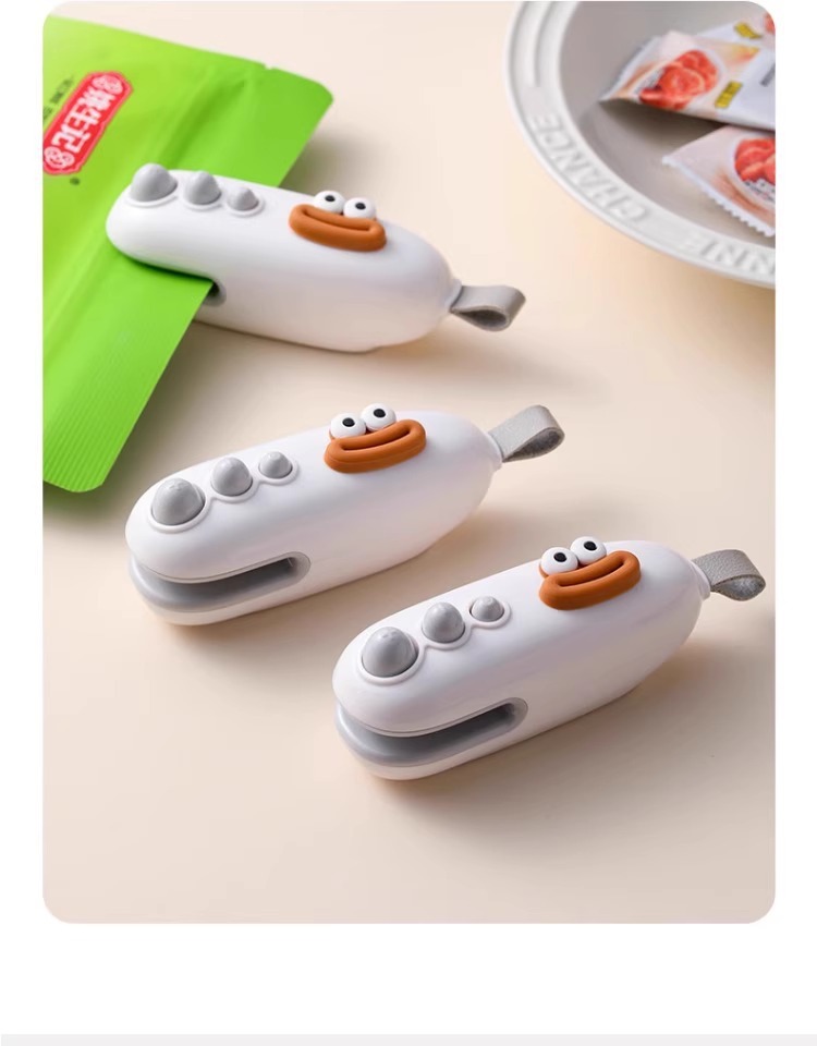 Mini hand-press plastic bag sealing machine