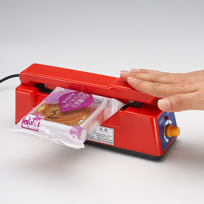 Green Dragonfly food sealing machine, vacuum hand-press