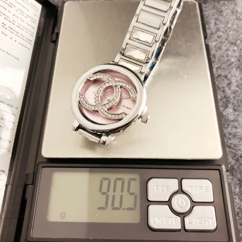 Women's quartz watch with stone accents, round open dial, pink