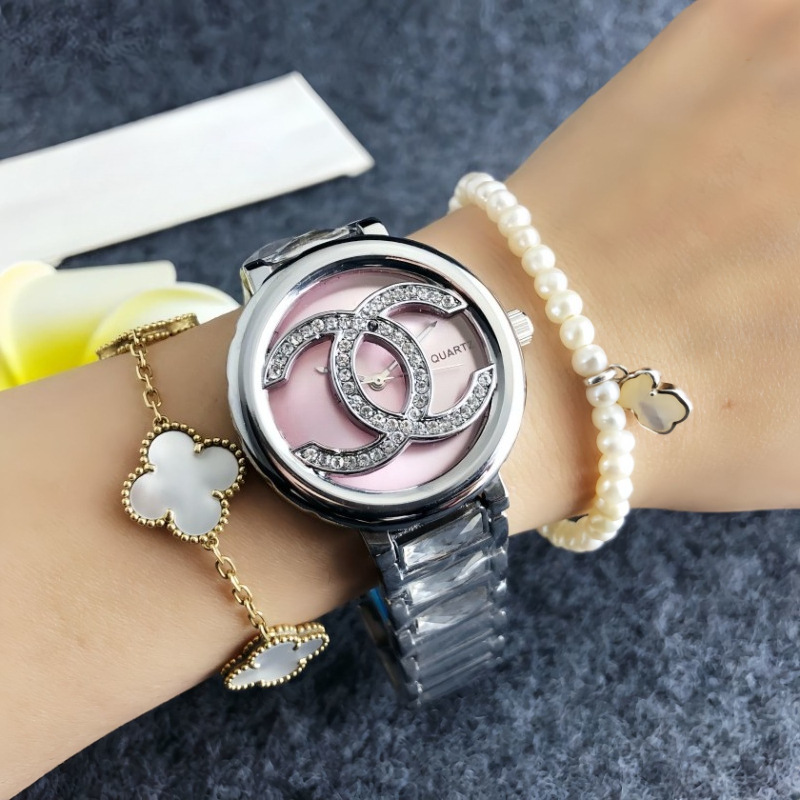 Women's quartz watch with stone accents, round open dial, pink