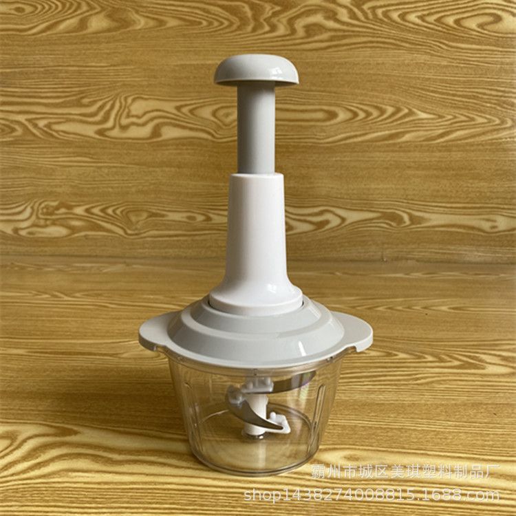 Hand-operated vegetable chopper for home kitchen use