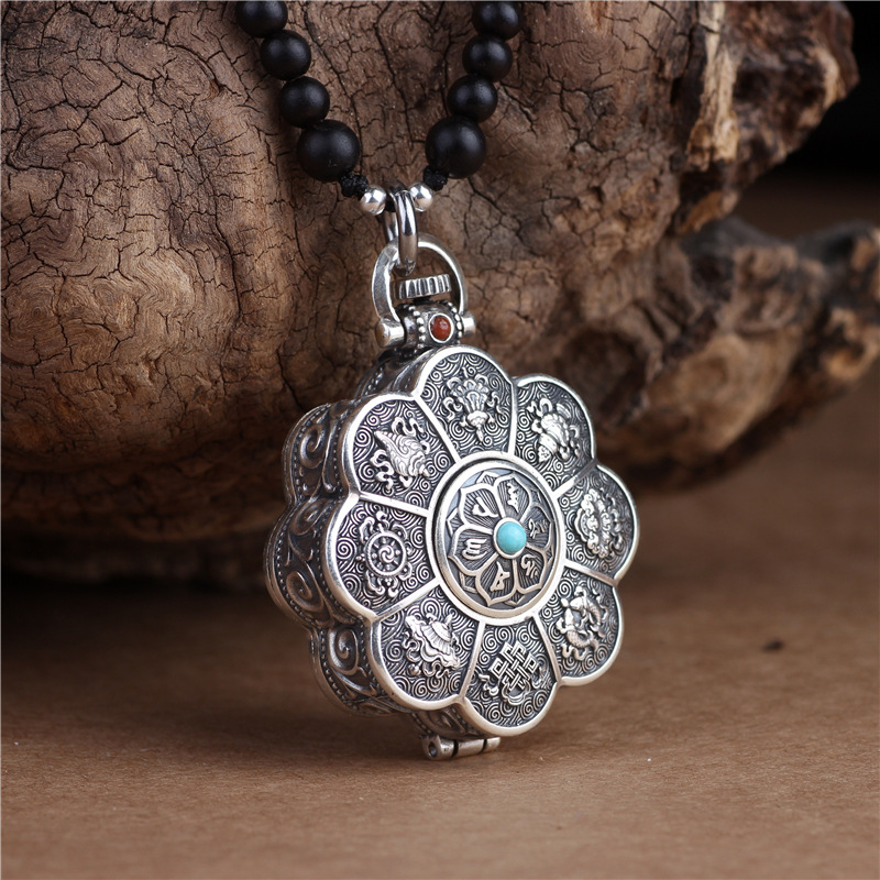 Silver lotus pendant with openable box, six character mantra design