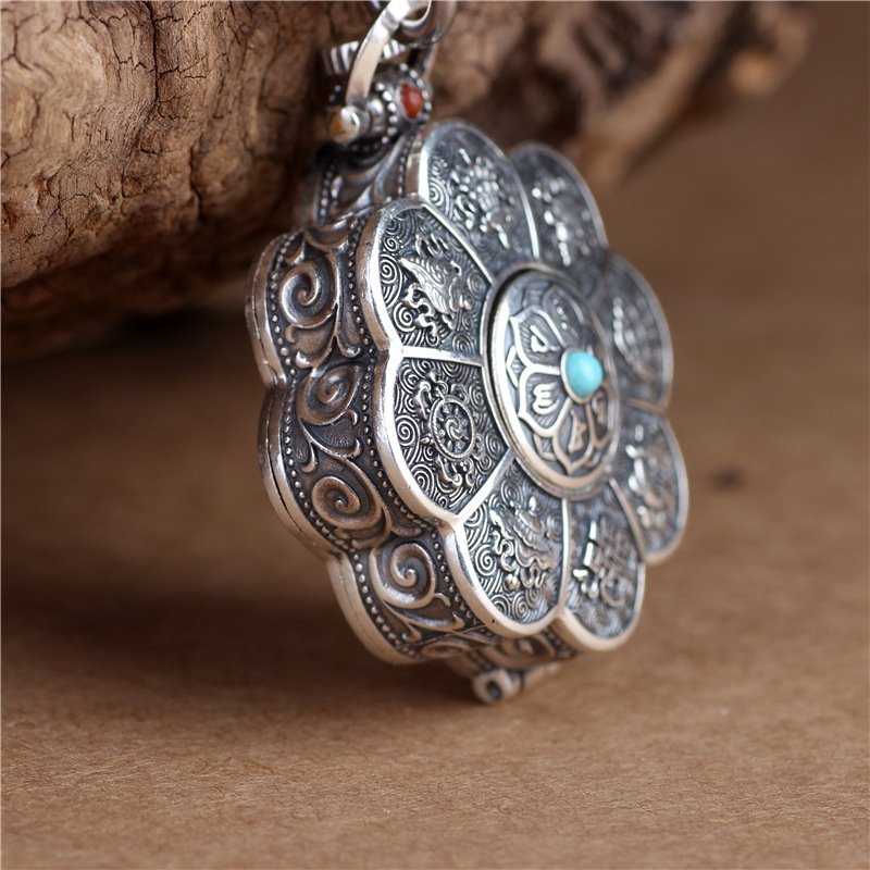 Silver lotus pendant with openable box, six character mantra design