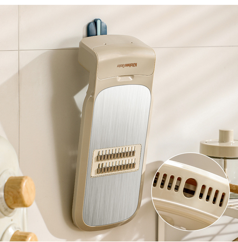 Vegetable cutter and grater with hand guard slicer function
