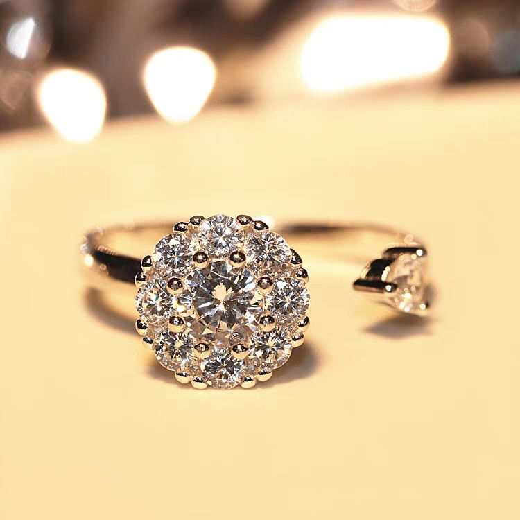 Rotating ring for women with rhinestones