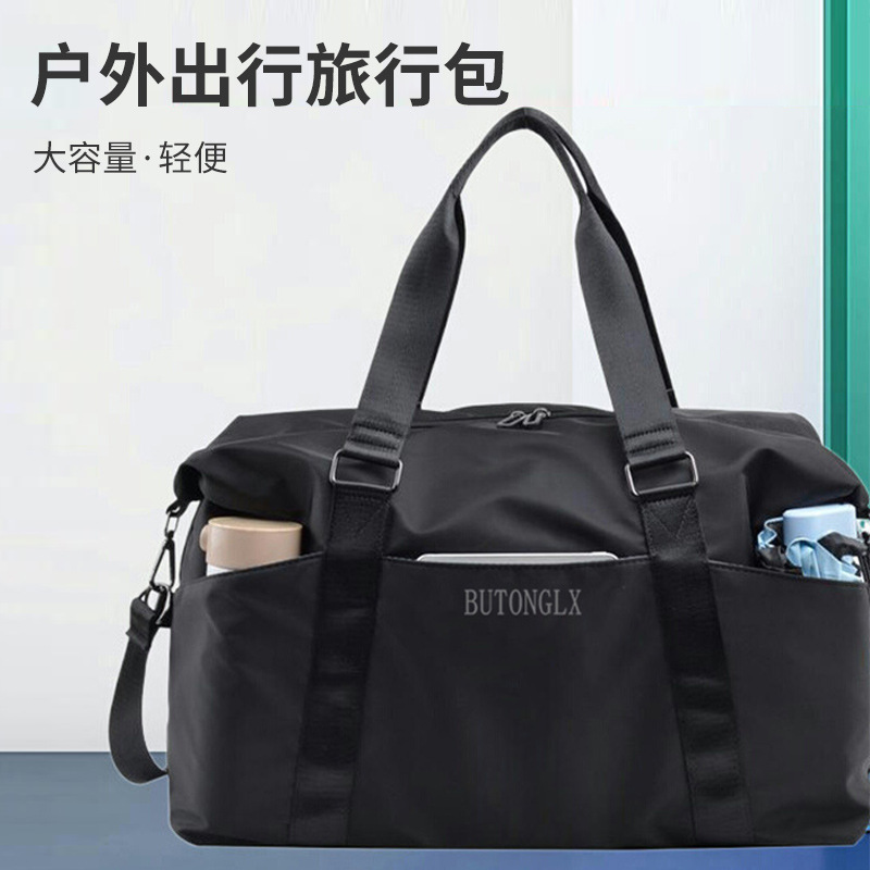 Travel bag with large capacity shoulder strap
