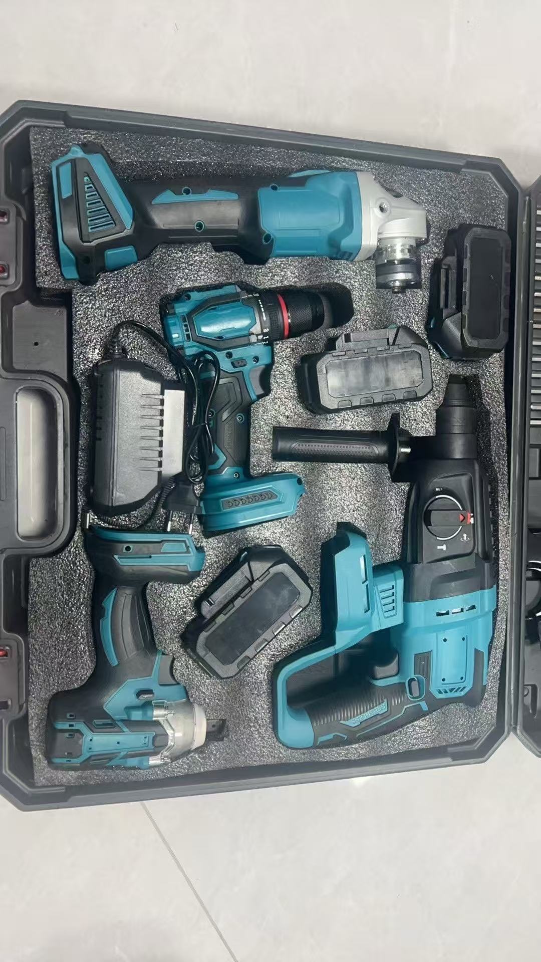Electric tool set 4-piece drill, wrench, grinder and hammer
