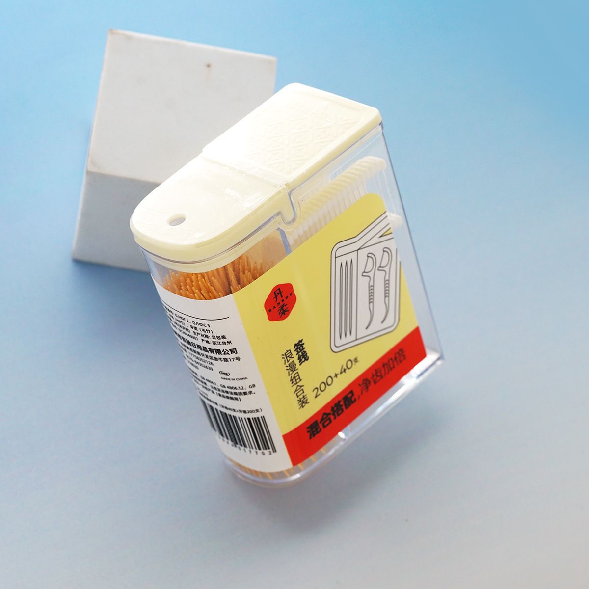 Dental floss and toothpick storage box