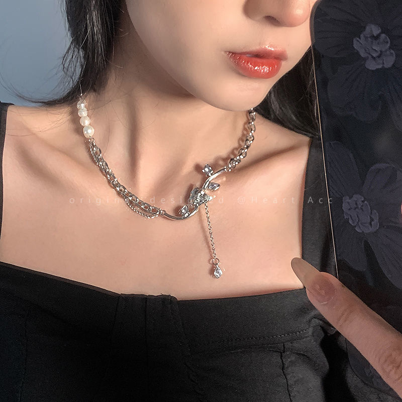 Pearl tassel necklace with petal design