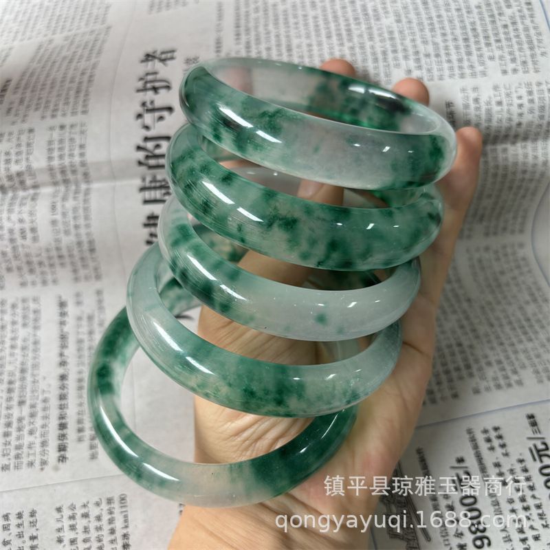 Natural jade bracelet with floating flower design