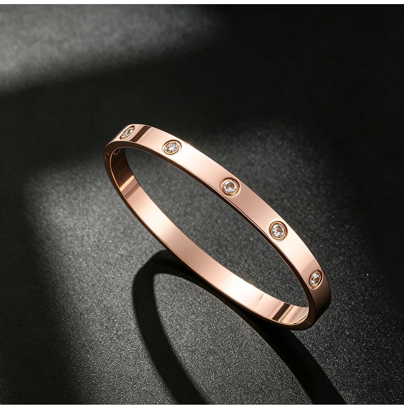 Titan-Stahl Armband, 18K vergoldet, 10 Steine mit Schiebeknoten
