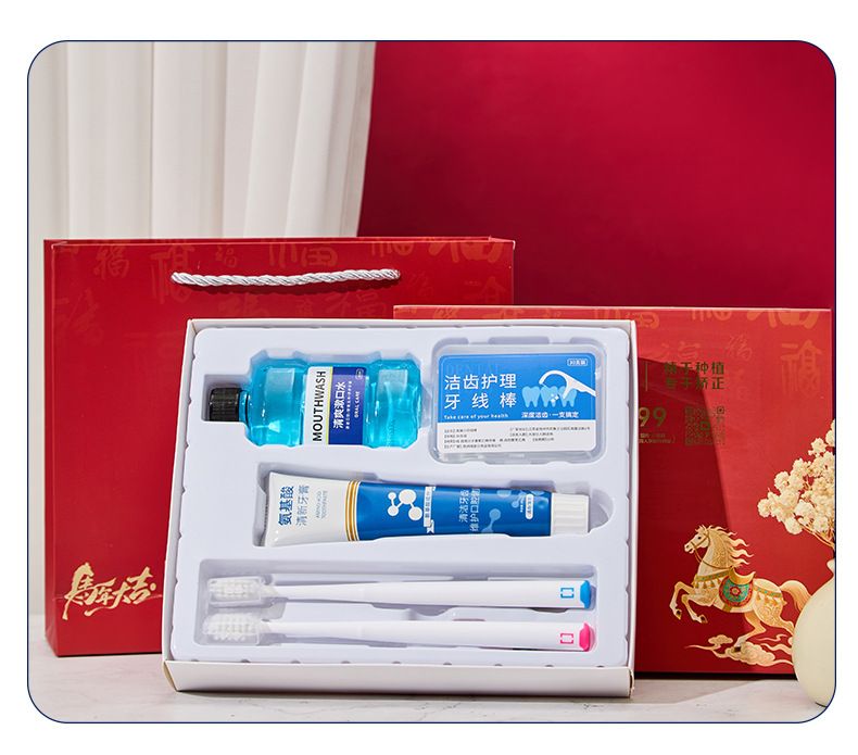 Oral care gift set with toothbrush, toothpaste and floss