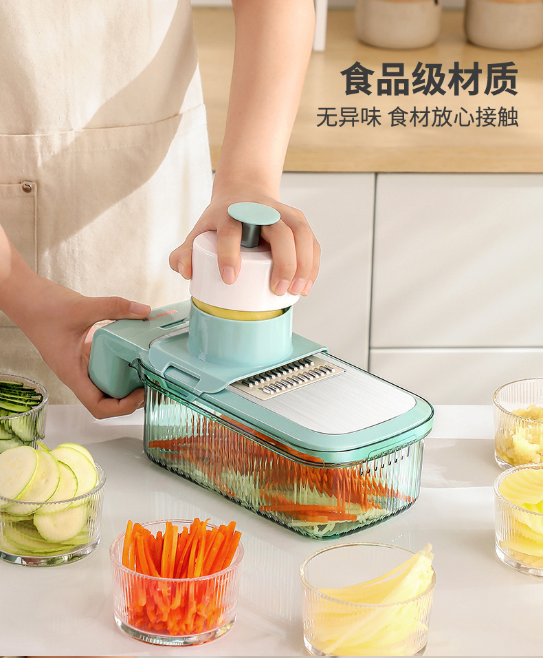 Vegetable cutter and grater with hand guard slicer function