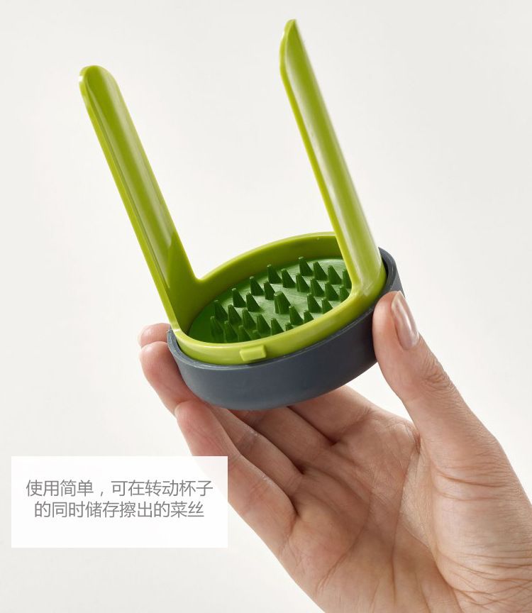Multifunctional vegetable cutter with rotating container for cucumbers and zucchini