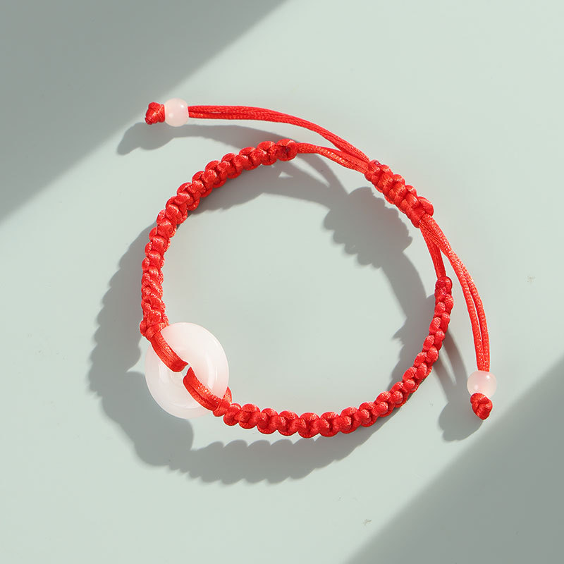Red string bracelet, jade, safety clasp, hand-woven, unisex