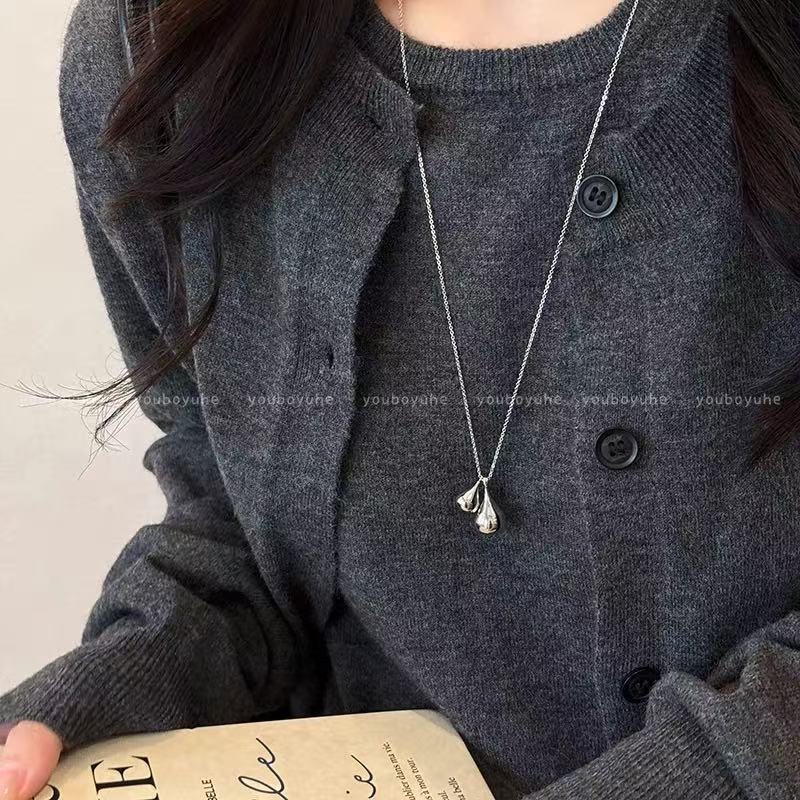 Round ring pendant necklace, black cord, long chain style