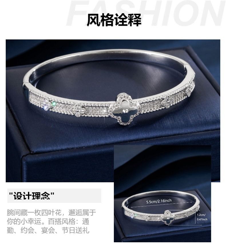 Vierblatt-Blüten-Kupferarmband, vergoldet, mit Zirkonia besetzt