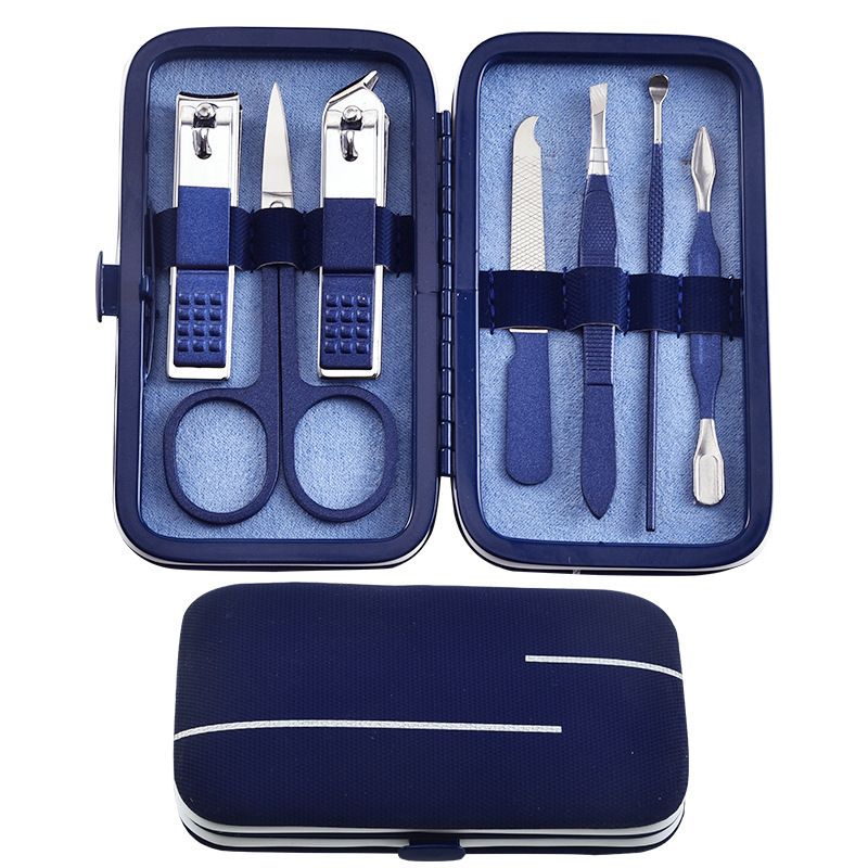 Black nail scissors set with nail clippers and manicure tools