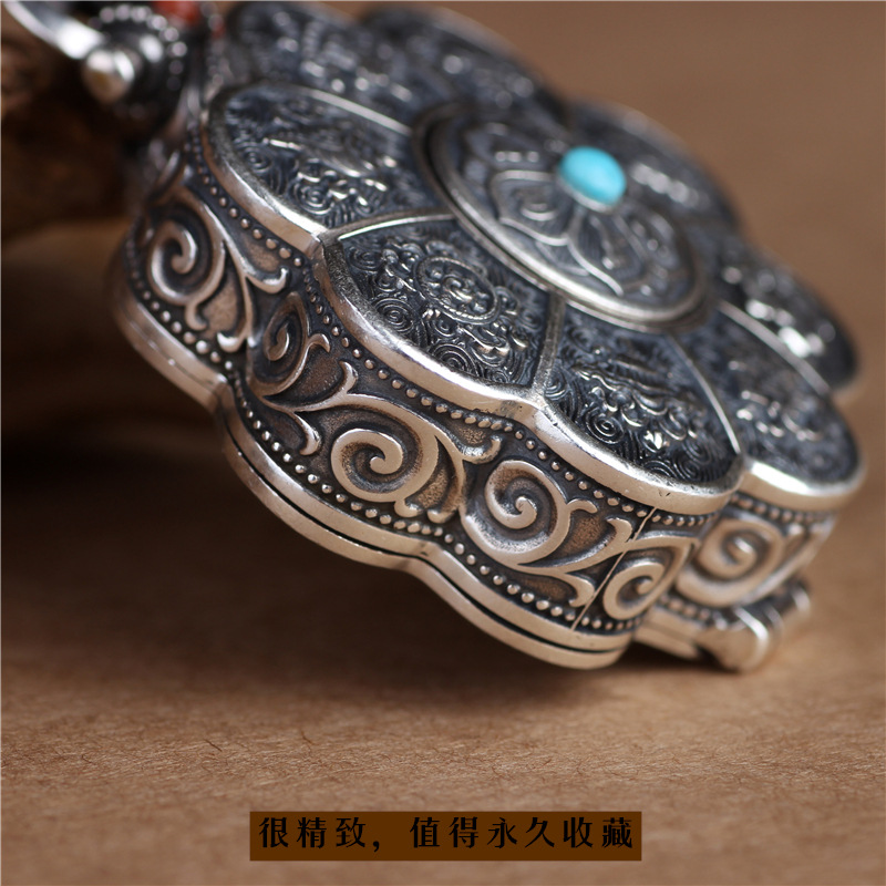 Silver lotus pendant with openable box, six character mantra design