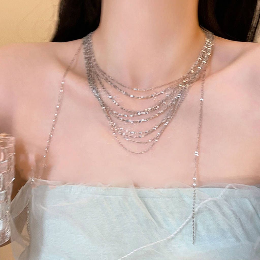 Multi-layer clavicle chain necklace with stackable tassels