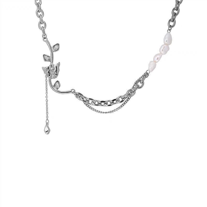 Pearl tassel necklace with petal design