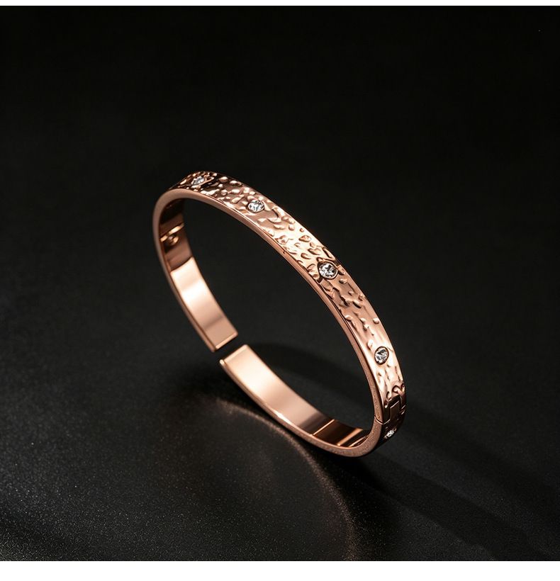 Titan-Stahl Armband, 18K vergoldet, 10 Steine mit Schiebeknoten