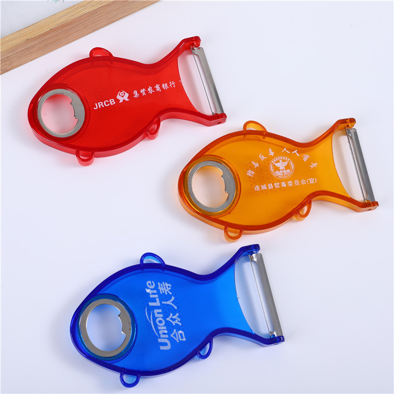 Fish-shaped stainless steel fruit peeler, transparent