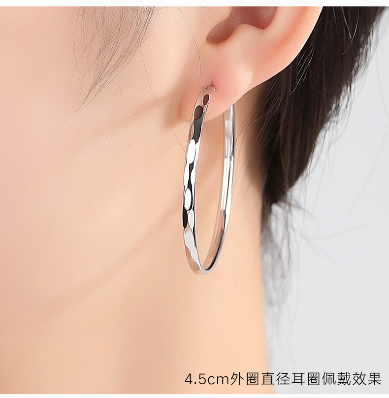 Silver large hoop earrings, round design