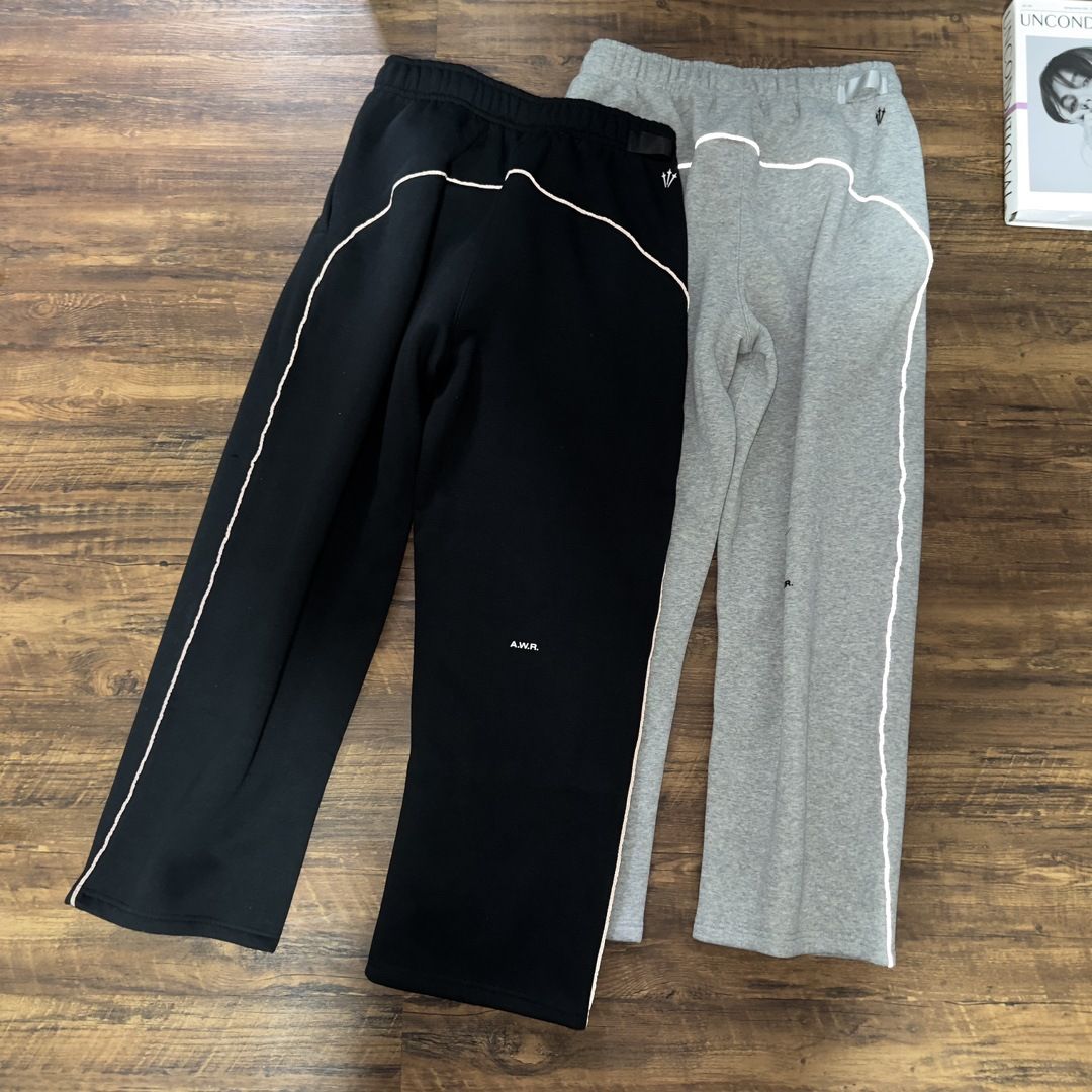 Herren-Fleece-Trainingsanzug mit Weiten-Beinen und reflektierendem Streifen
