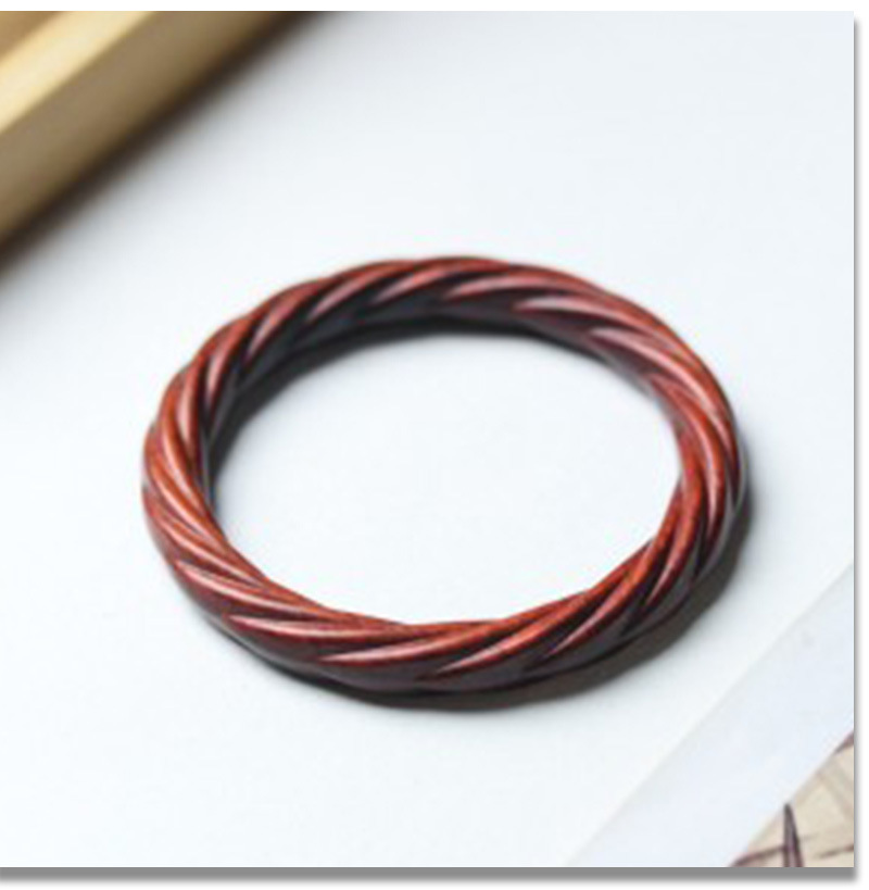 Chinesisches Holzarmband mit Drehstruktur-Design