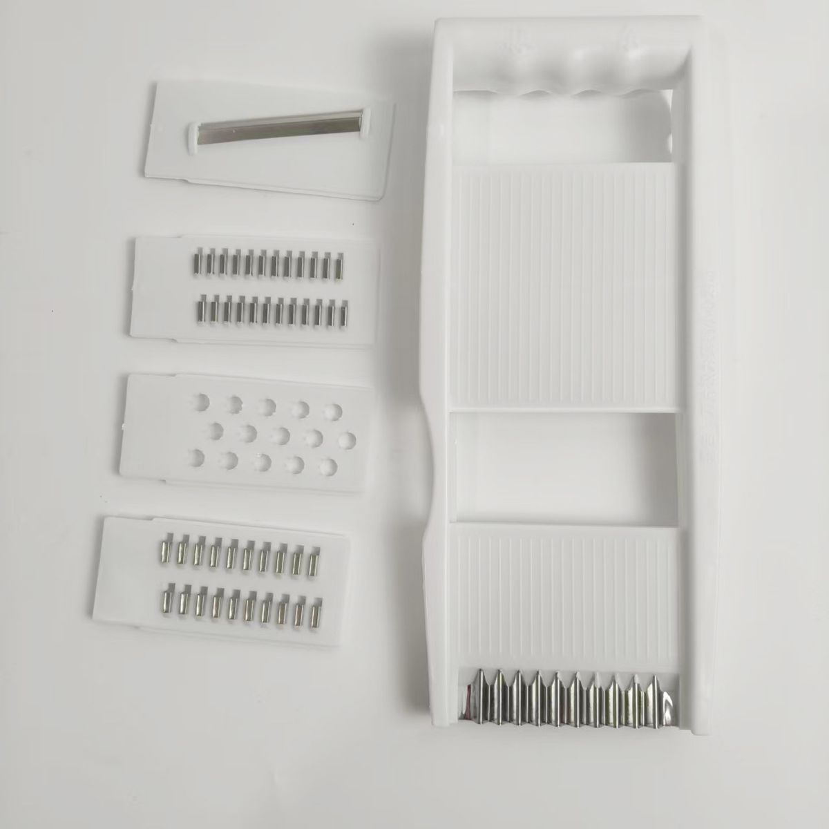 Multifunctional vegetable cutter 1278 with grater 1168 and potato shredder