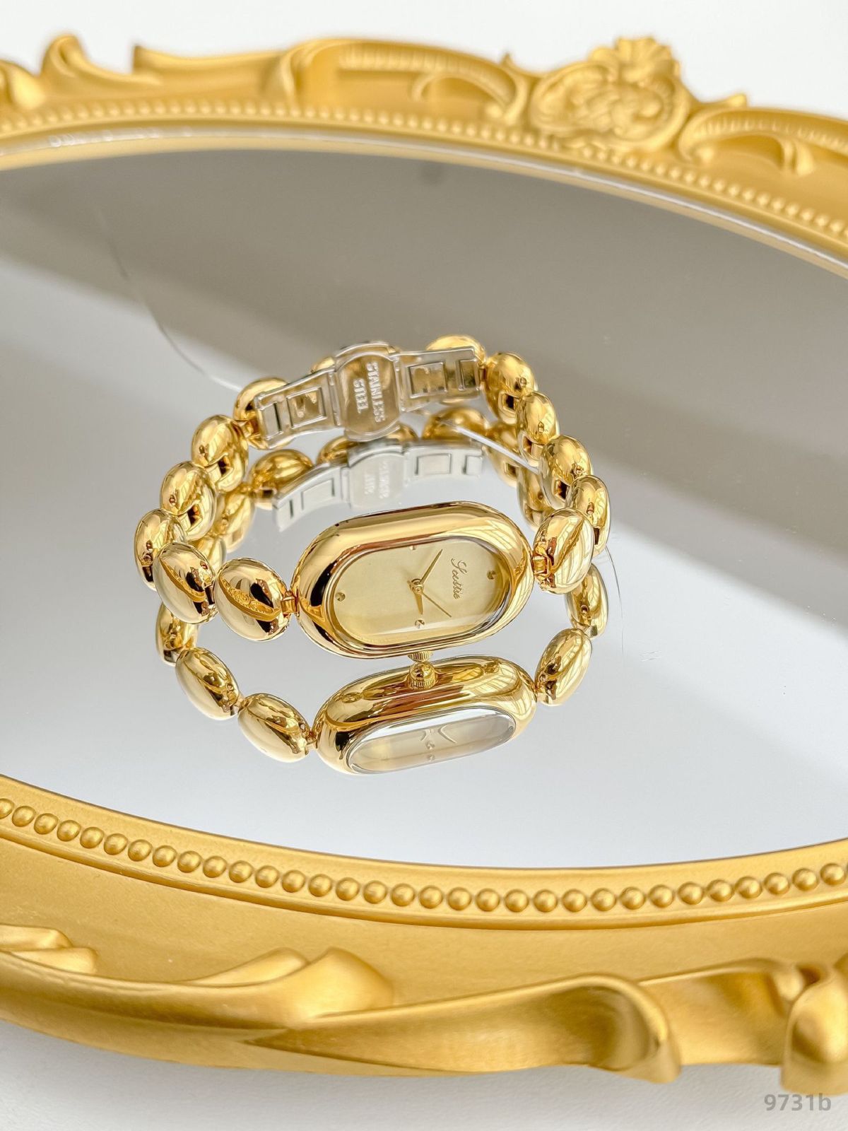 Scottie9731B gold women's watch, oval design