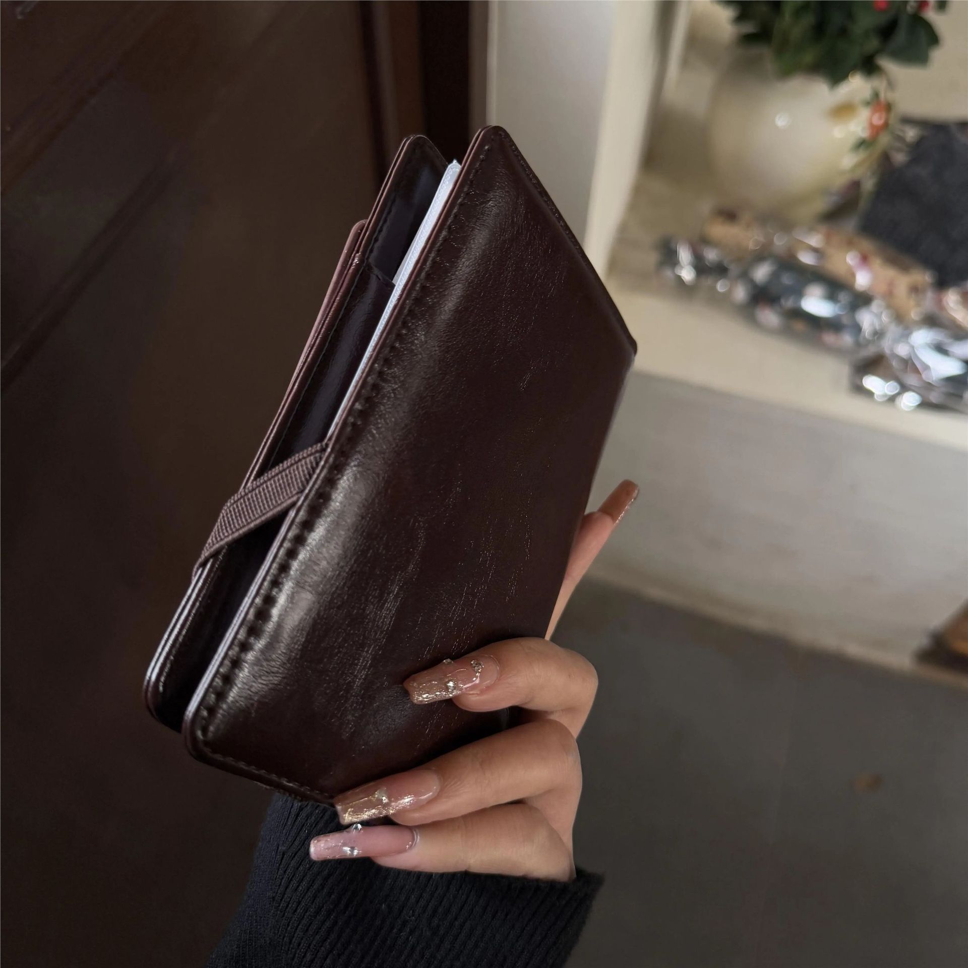 Passport holder with multi-functional storage for cards, documents and tickets