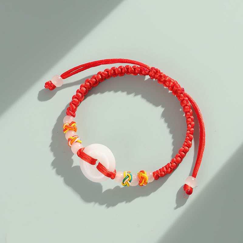 Red string bracelet, jade, safety clasp, hand-woven, unisex