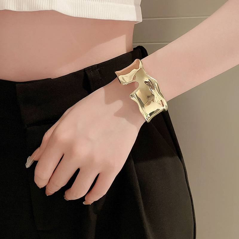 Metal geometric open bangle, gold tone