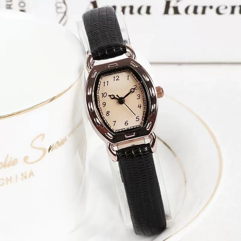 Vintage barrel-shaped women's watch, leather strap, quartz