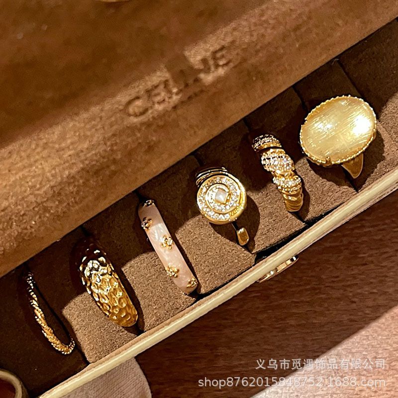 Gold egg-shaped gemstone stackable ring for women