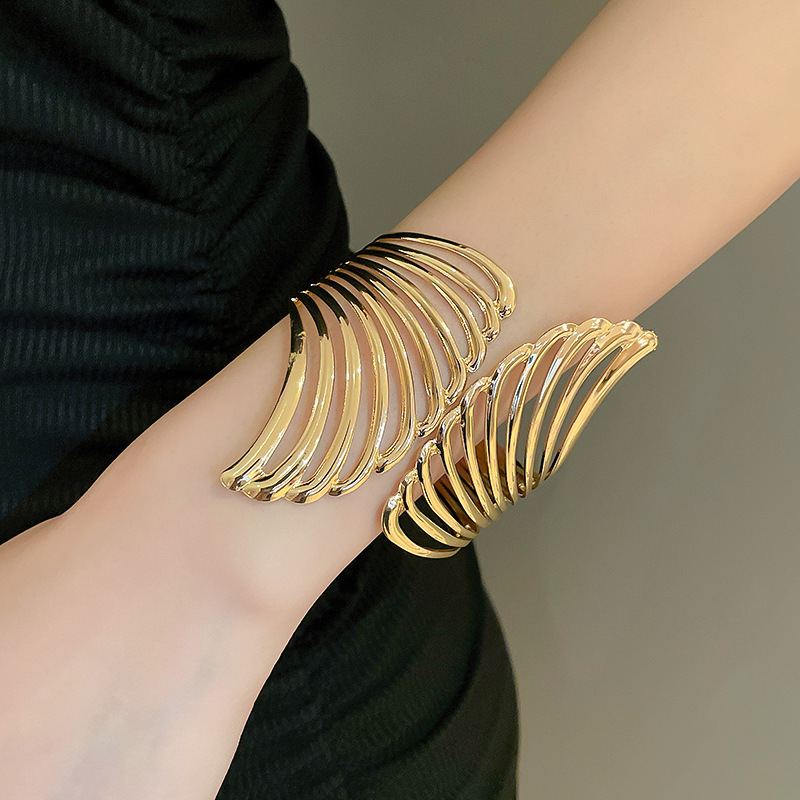 Metal geometric open bangle, gold tone