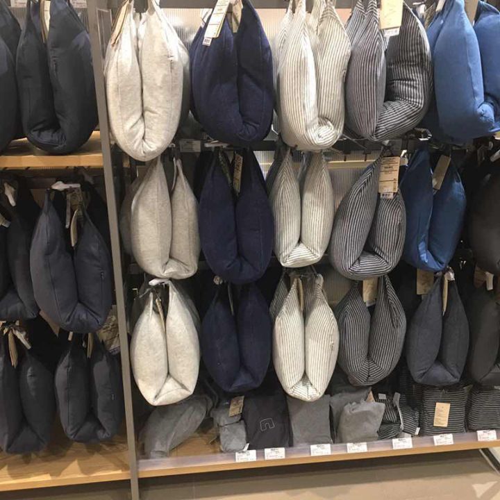 Muji U-shaped neck support pillow for travel and napping