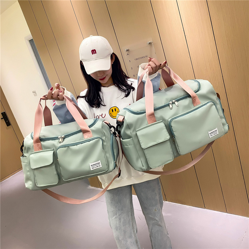 Wholesale new trend sports bags for men and women, fitness bags with dry and wet compartments, swimming Oxford fabric handheld shoulder strap travel bags