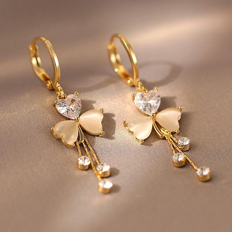 Lightweight luxury clover earrings with tassel detail