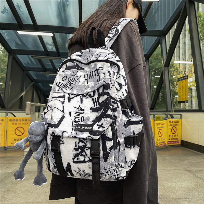 Trend Harajuku Style großer Rucksack mit Kapazität, Graffiti-Style cool und elegant für männliche und weibliche Schüler der Sekundarstufe und Mittelstufe.