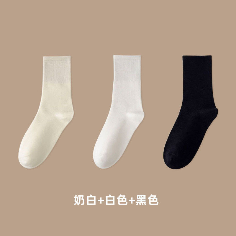 TikTok-Stil weiße nahtlose Socken für Damen, Mittelbein-Socken für alle vier Jahreszeiten, japanischer College-Stil, einfache, modische Slouch-Socken. - 10