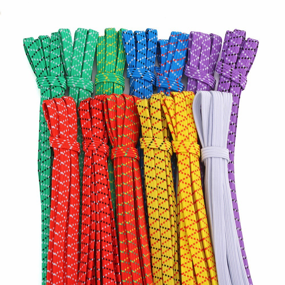Flache und runde bunte hochelastische Gummibänder