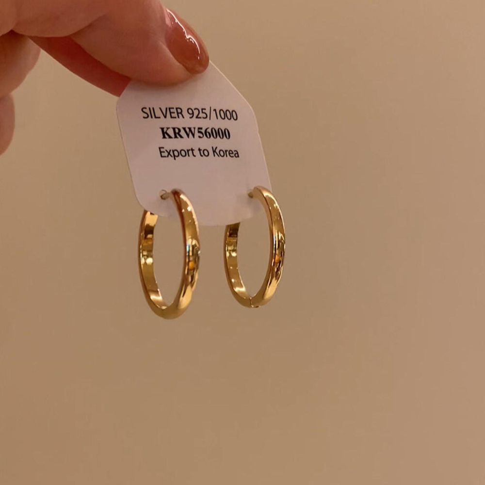 Gold circle earrings, minimalist design - 1